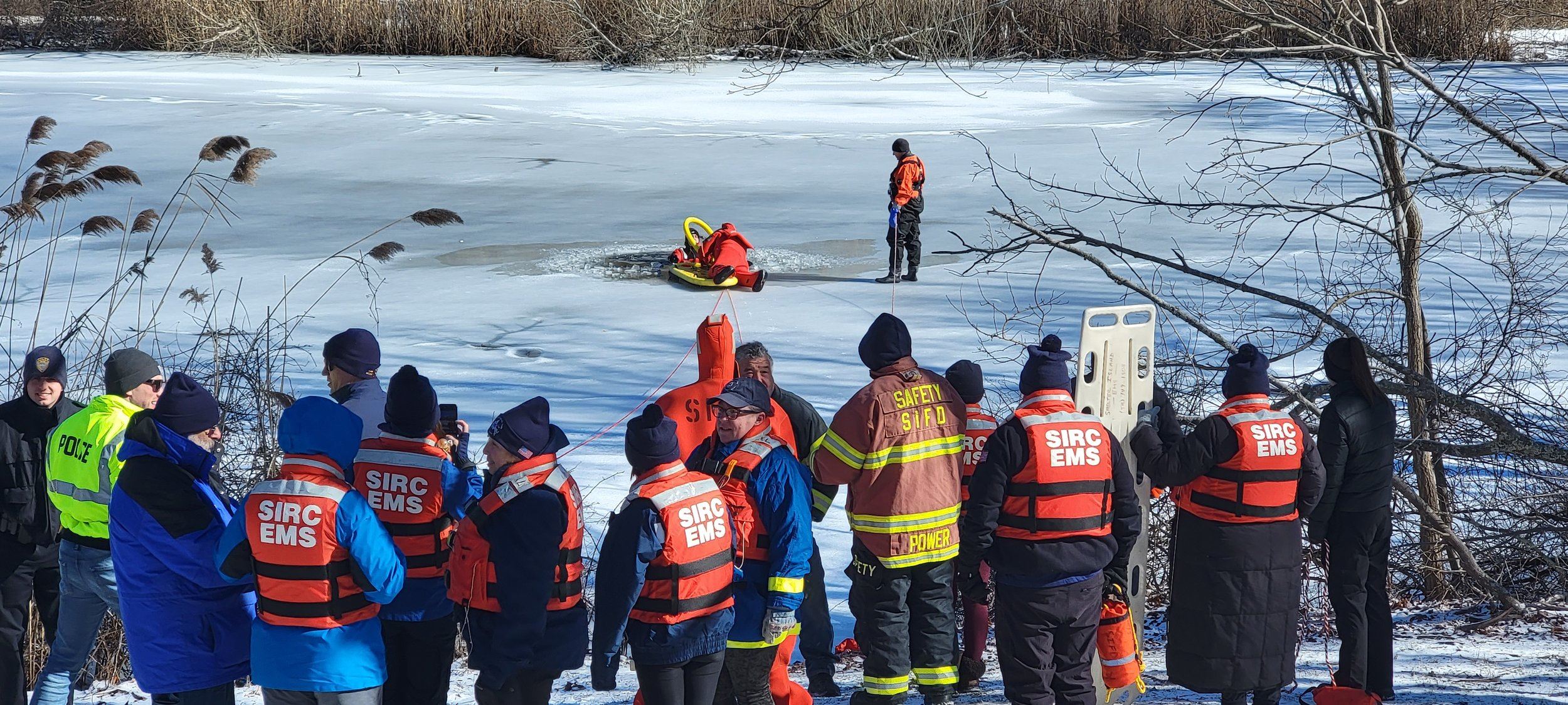 Group of EMS at frozen lake